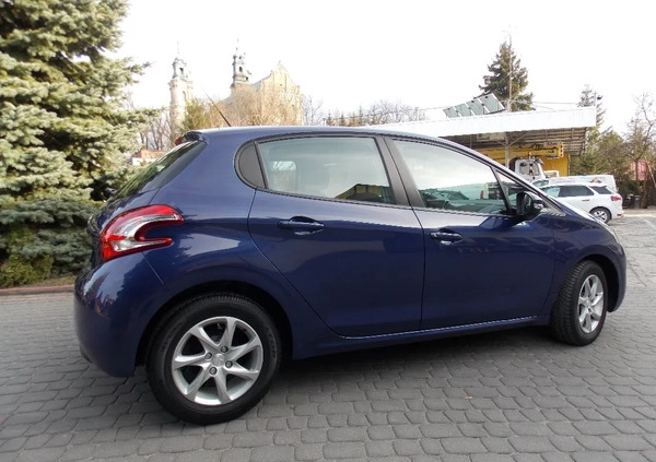 Peugeot 208 cena 28500 przebieg: 84200, rok produkcji 2014 z Jarosław małe 232